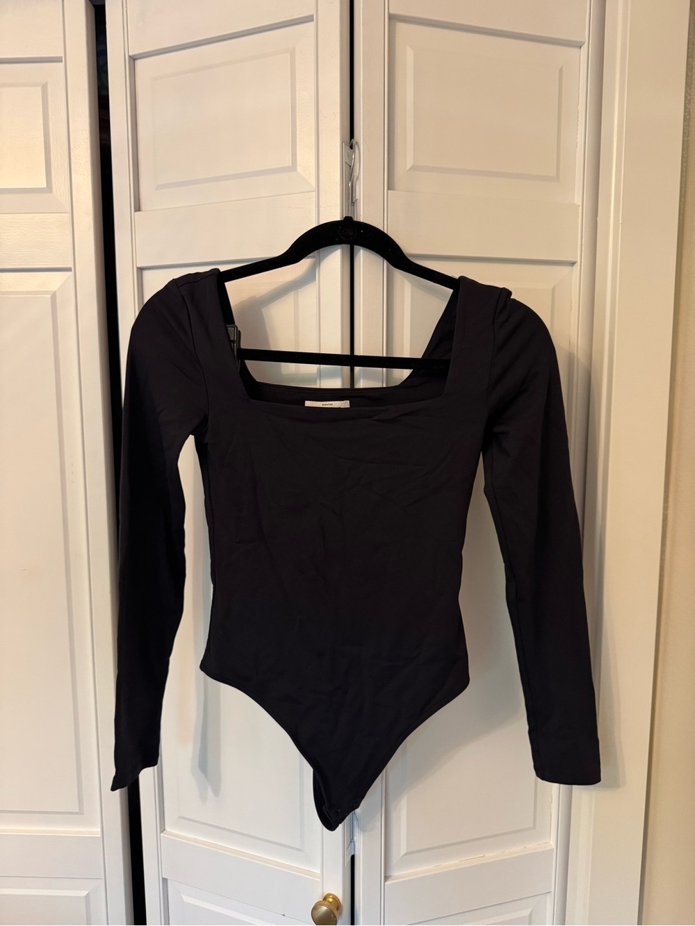 Aritzia Babaton Contour Black Long-Sleeve One-Piece Bodysuit